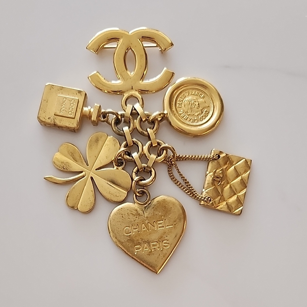CHANEL Gold Charm Brooch
